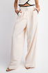 CREAM WITH BLACK PANTS